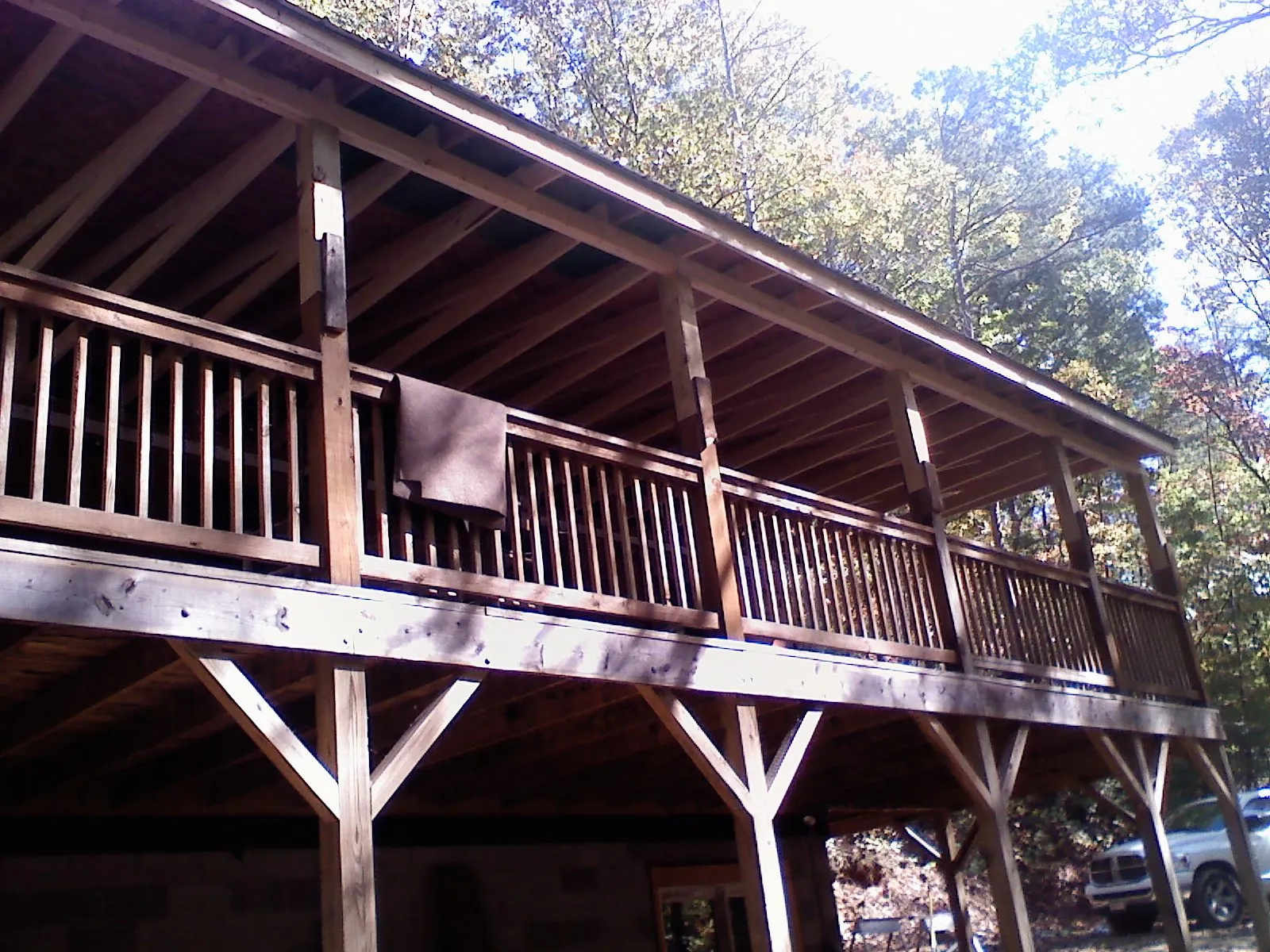 Timber framing under a new elevated porch and deck — Roof Leak Repair in New Glarus by Roofing Brothers